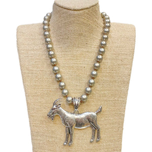 Silver Metal Goat Pendant on a Faux Navajo Pearl Necklace